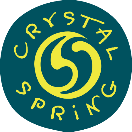 Crystal Spring brand logo for natural deodorant products, circular design with yellow lettering on teal background